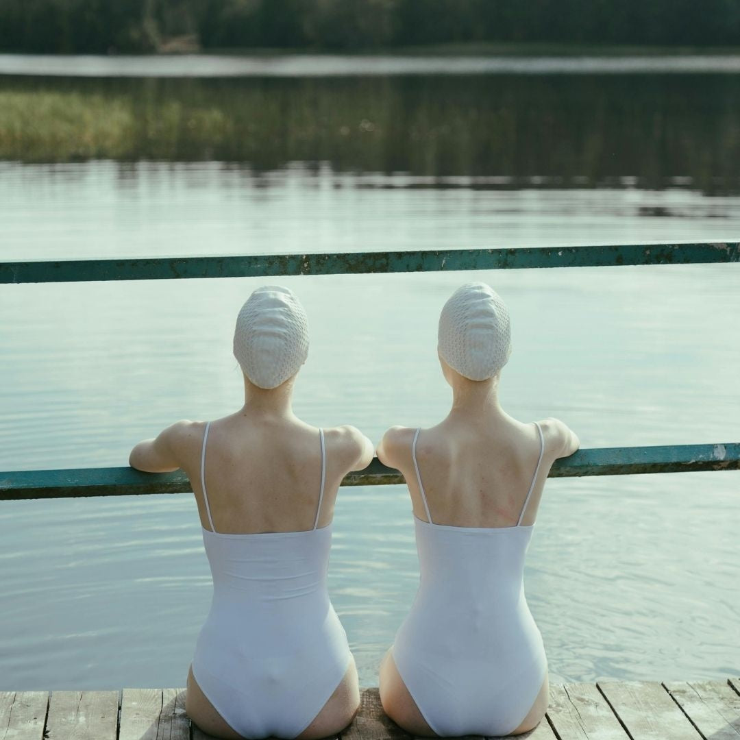 Two swimmers on a Finnish lake jetty